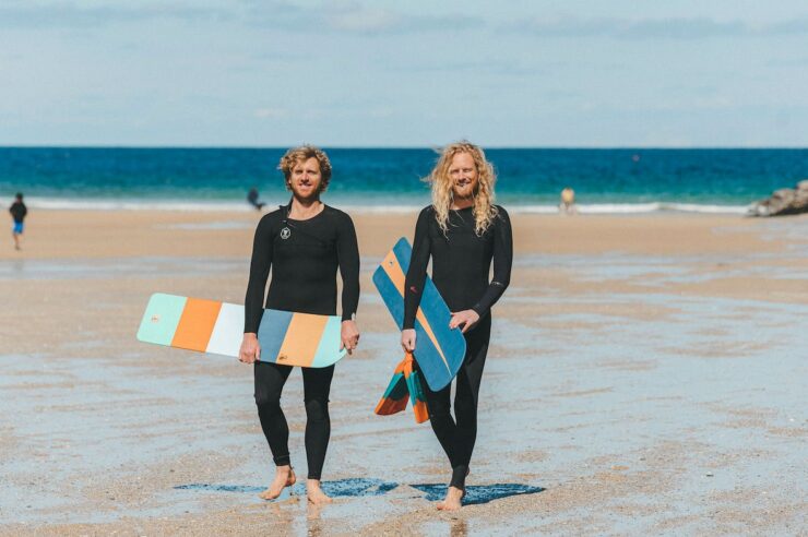 Image for Surfers offer free wooden bellyboards to cut plastic pollution